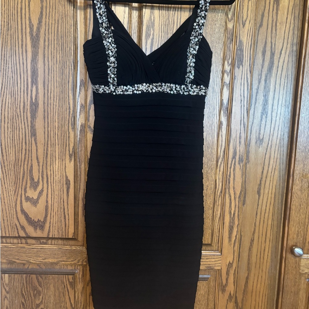 Beautiful new without tags Black Beaded V-Neck Women’s Cocktail Dress